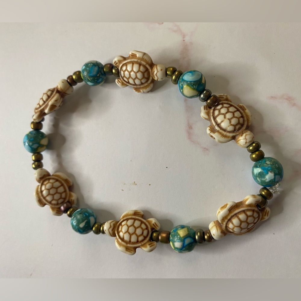 White Turtle with Marbled Teal Beads